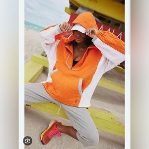 Free people movement trapped in paradise colorblock orange pullover nwot medium
